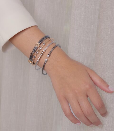 Farah El Khoury Jewelry, image of hand wearing white golden bracelet