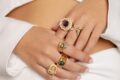 Jewelry Khoury, image of a woman showcasing golden rings