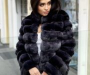 Enigma, image of a woman showcasing a jacket