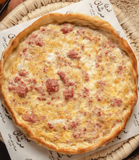 Furn-Merchak, image of manouche of eggs and sausages