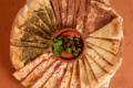 Furn Merchak, image of different kinds of manouche, zaatar, cheese, ham and pepper