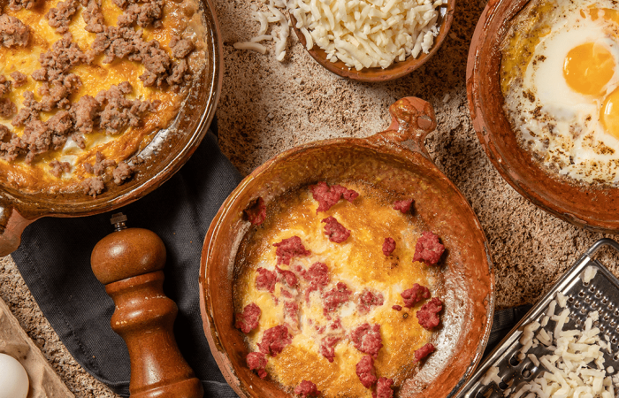 Furn-Merchak, image of plate of eggs and sausages