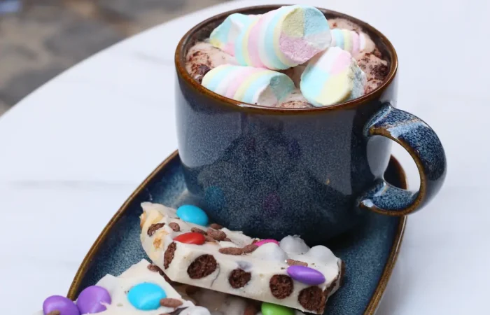 Sweeteria, image of hot chocolate, and marshmallow