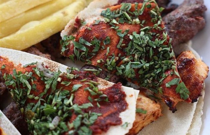 Machewe Express, image of grilled meat plate with vegetables and fries