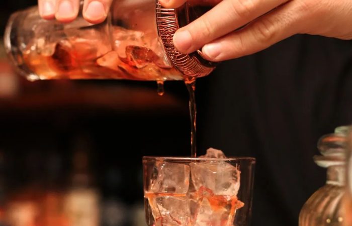 Pierre and Friends, image of cocktail drink pouring into a cup